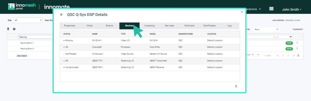 QSC Q-Sys DSP Details modal on the Devices tab listing connected peripherals and status